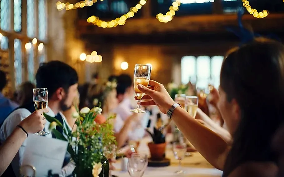 Guests raising a toast at a function