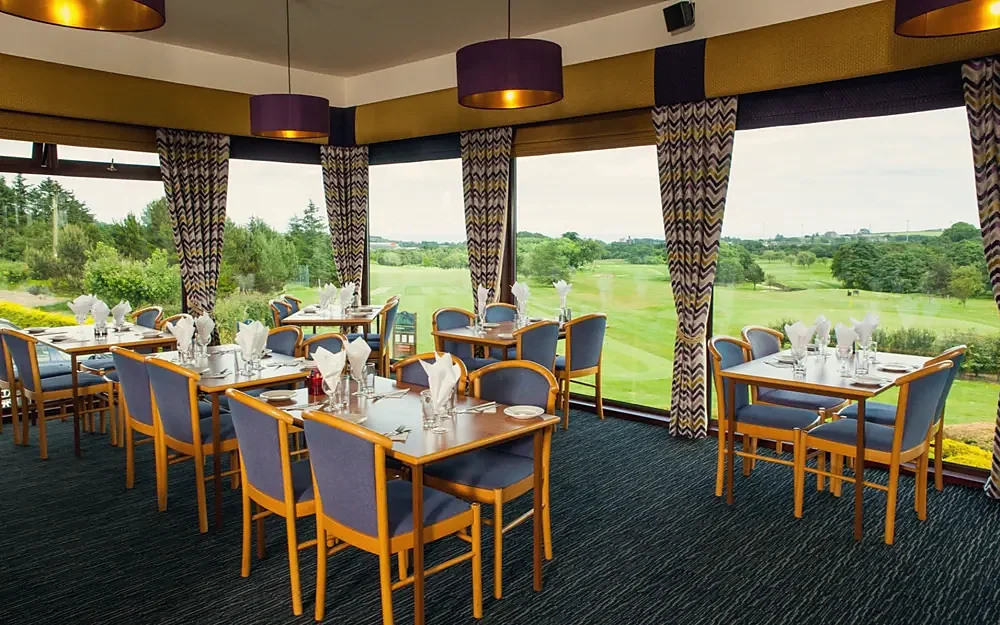 Restaurant tables with views over the course